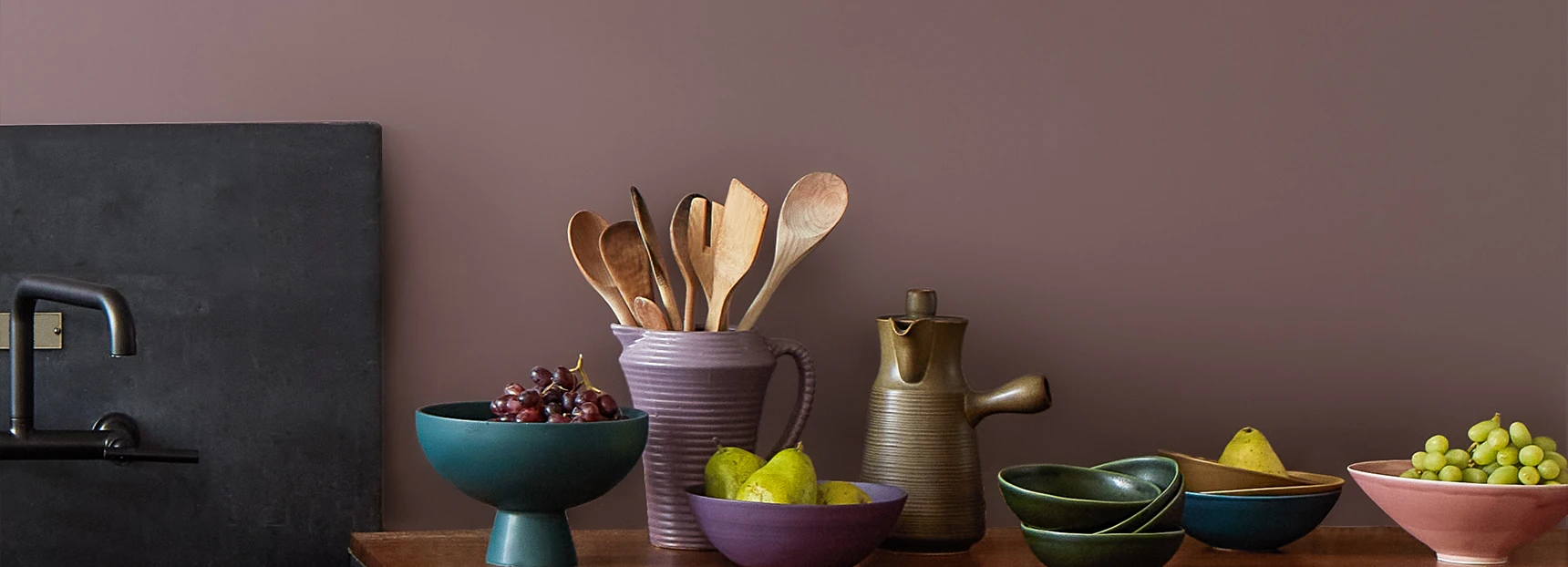kitchen counter with bowls of fruit